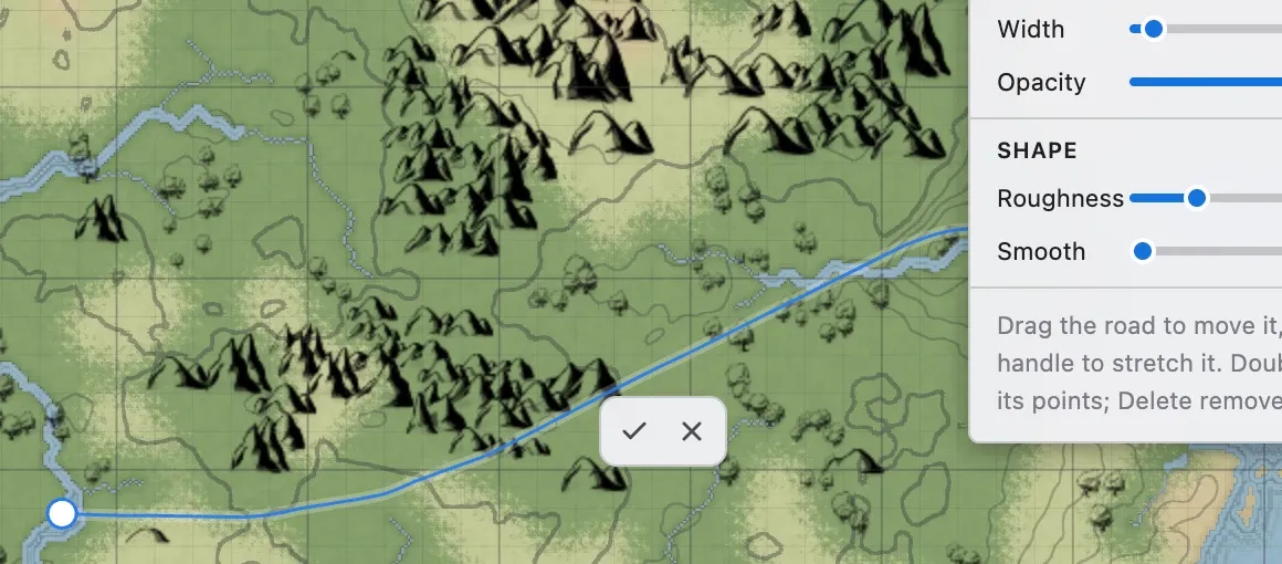 A selected road on the canvas, running over terrain, with an end handle and the confirm and cancel buttons.